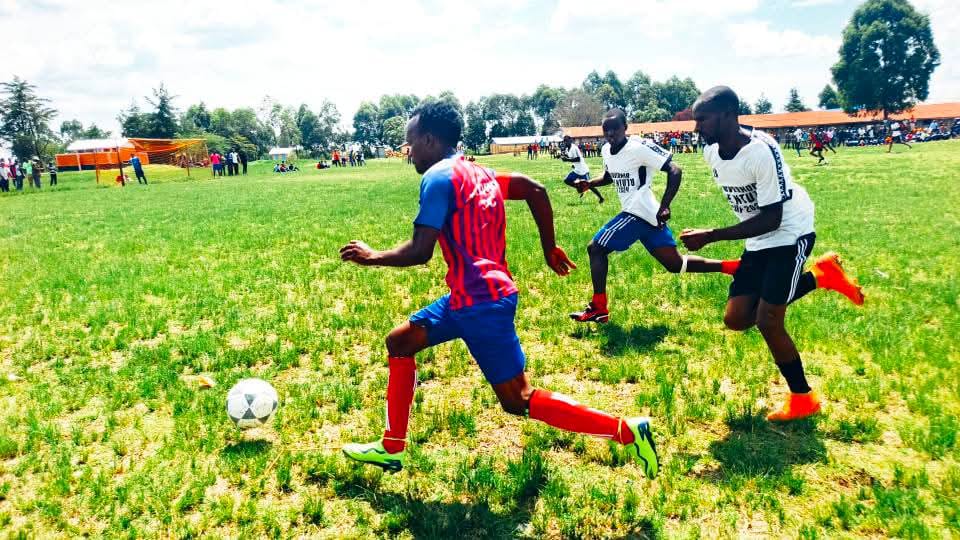 Players in action and players follow a match. PHOTO/Geoffrey Kimagut