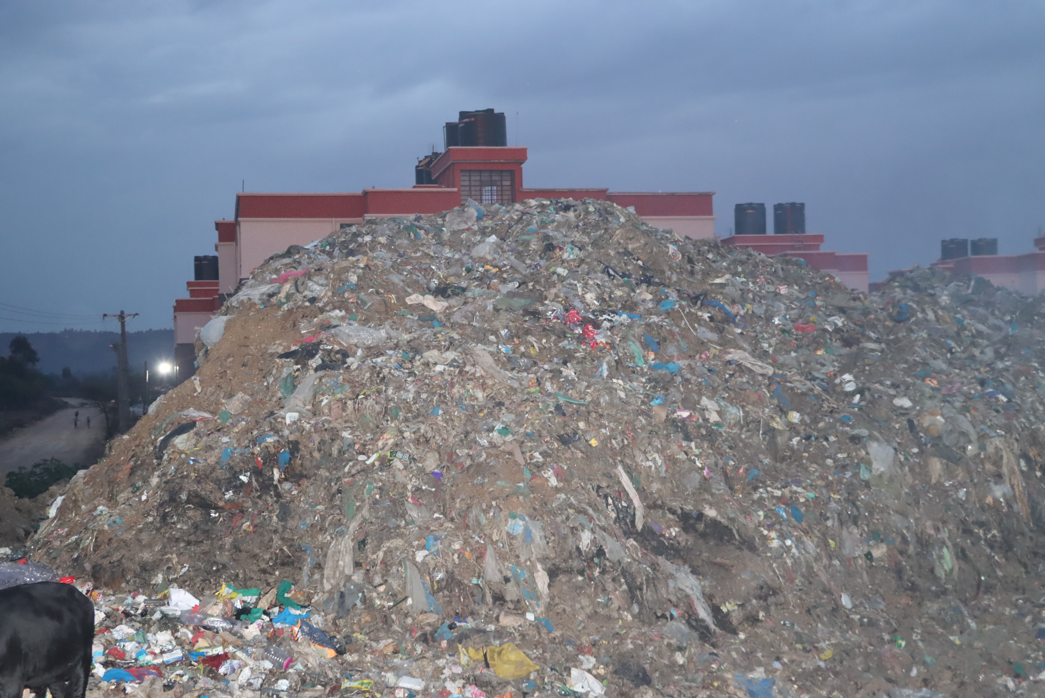 A mountain of waste imposing from Bomet dumping site adjacent to Bomet Universty and Chepalungu Affordable housing. Students have complained about the chocking smell from the dump site. Photo/Kipyegon Rono