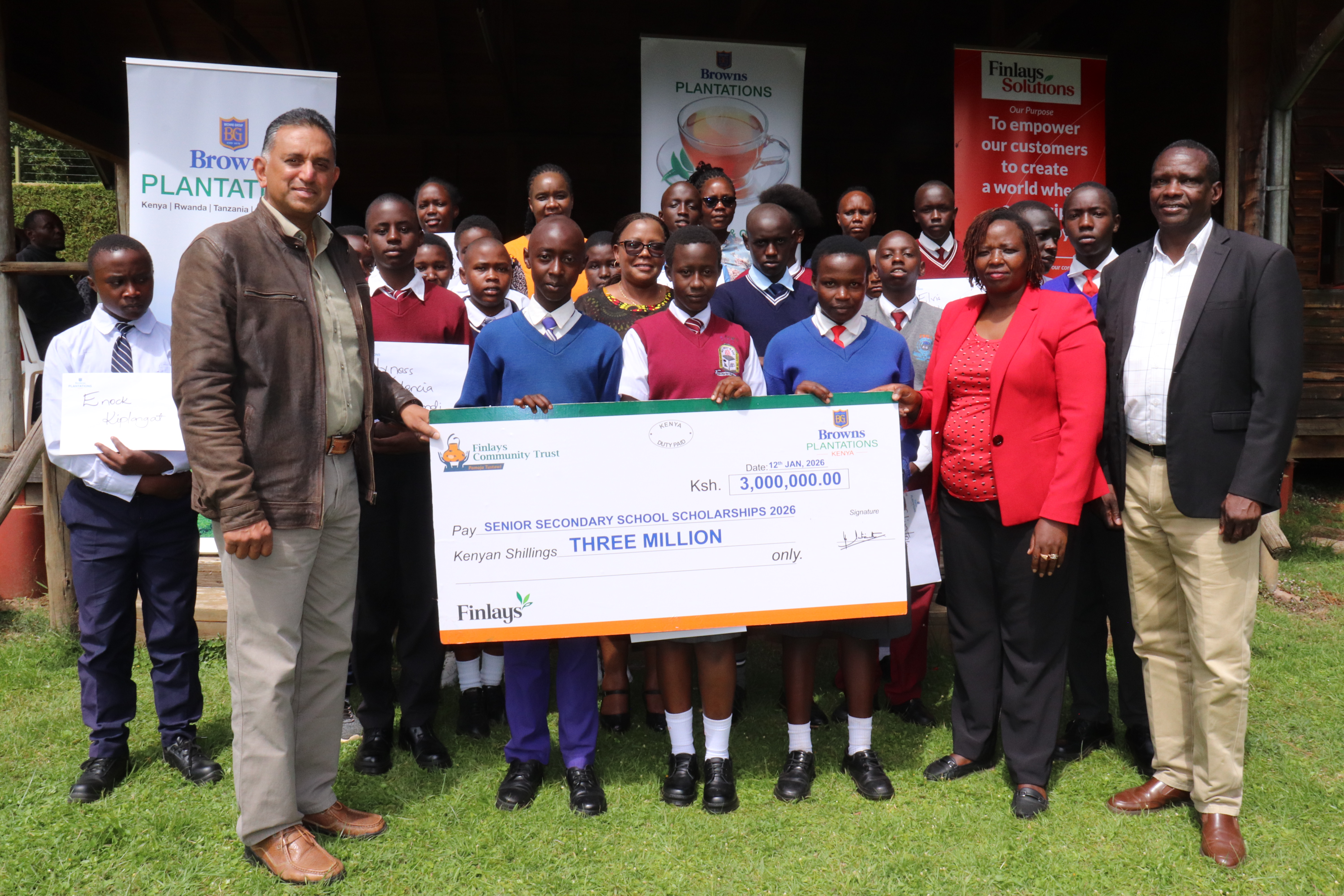 Browns Plantation CEO Mr Dushanth Ratwatte with some of the beneficiaries of Sh3 million scholarship . The move is expected to cushion company workers whose children performed well as they join  senior Secondary School. Photo/Gilbert Kimutai