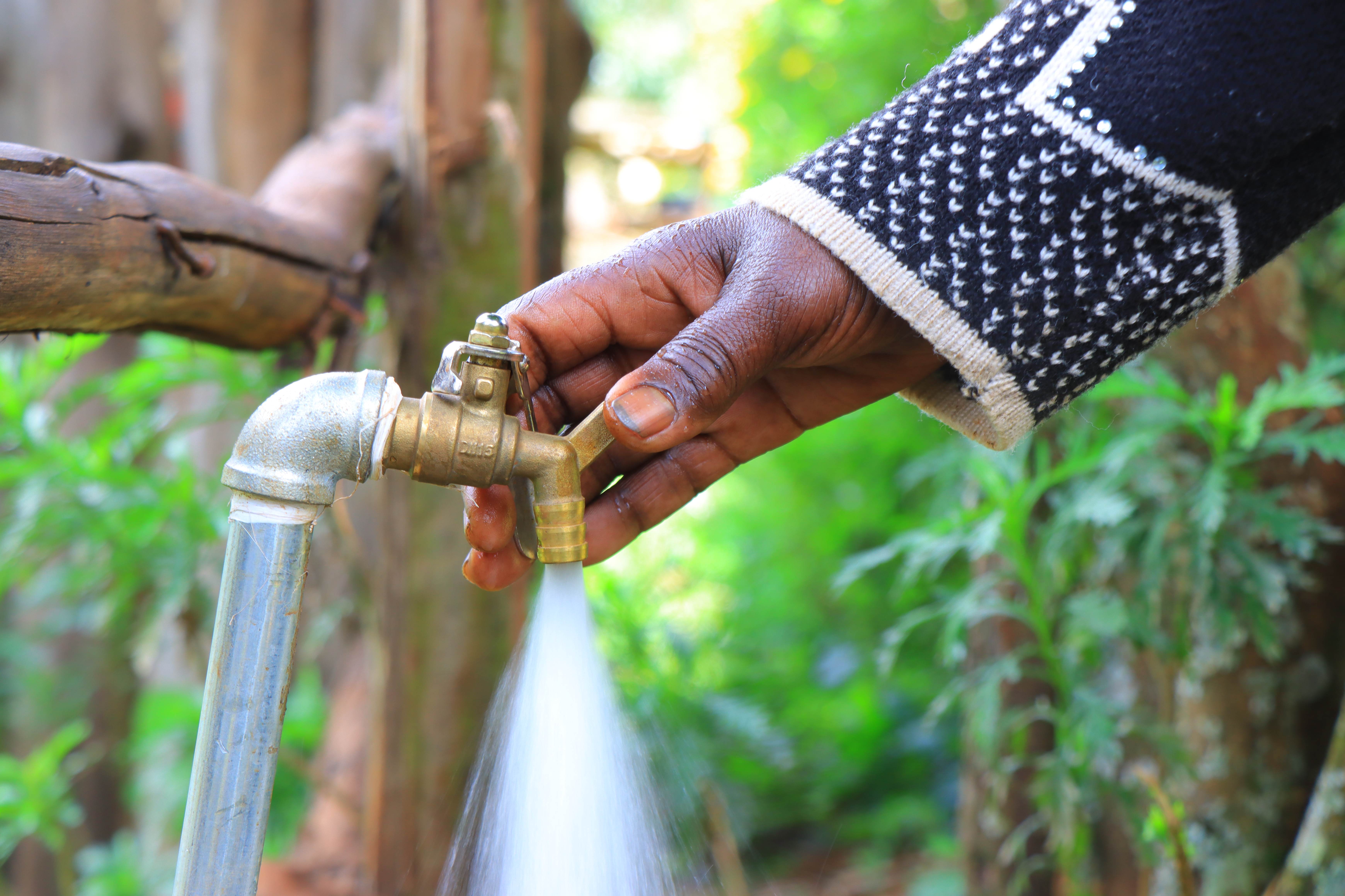 Clean water flows from a tap installed under the Oinab Tibik Stream Project.  IMG/EMMANUEL RONO