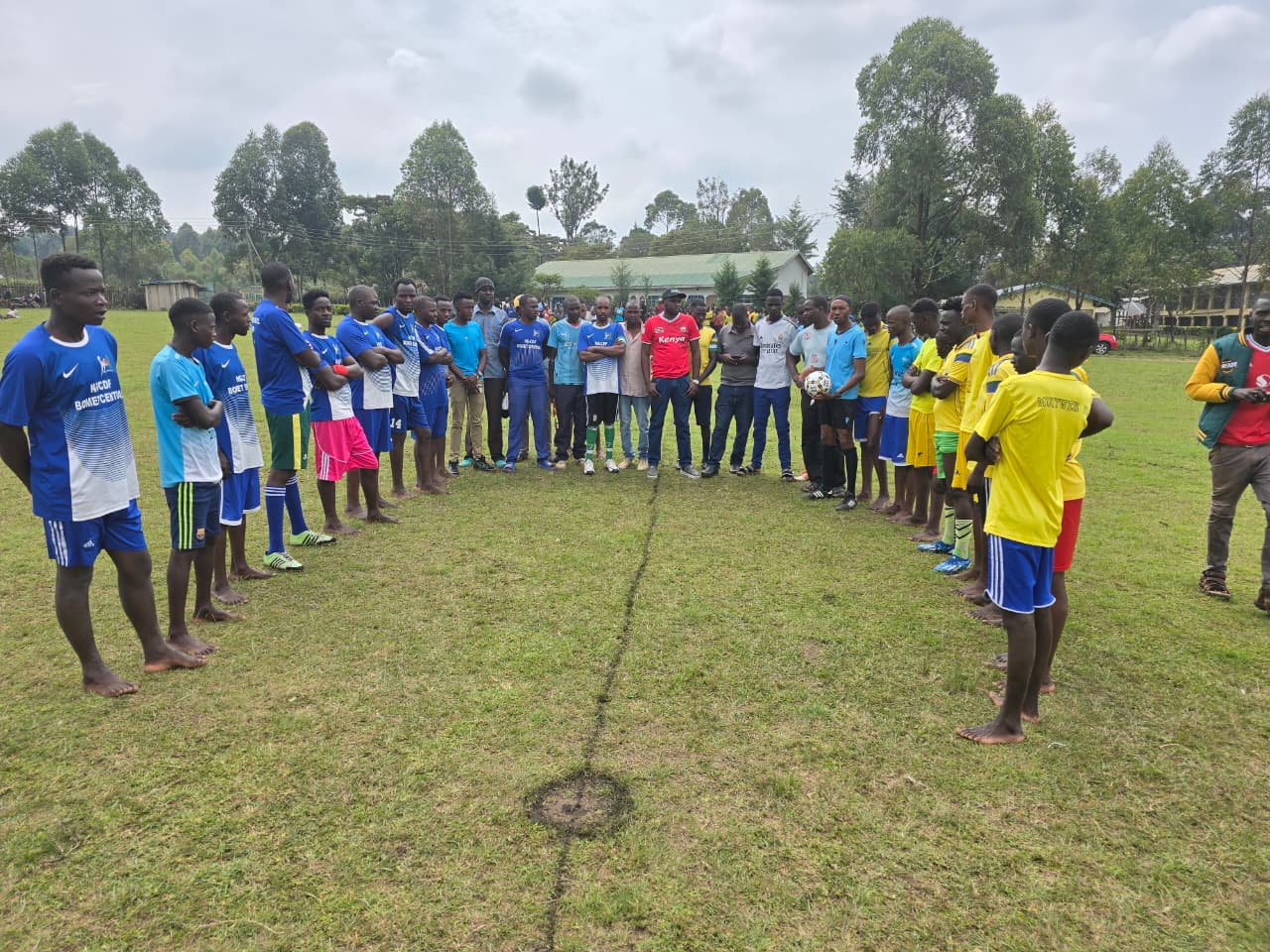 Sponsor Kenneth Rono together with players during the first edition of the Ken Ben Football Tournament held last year in Mutarakwa Ward, Bomet Central Sub-county.  PHOTO/Geoffrey Kirui