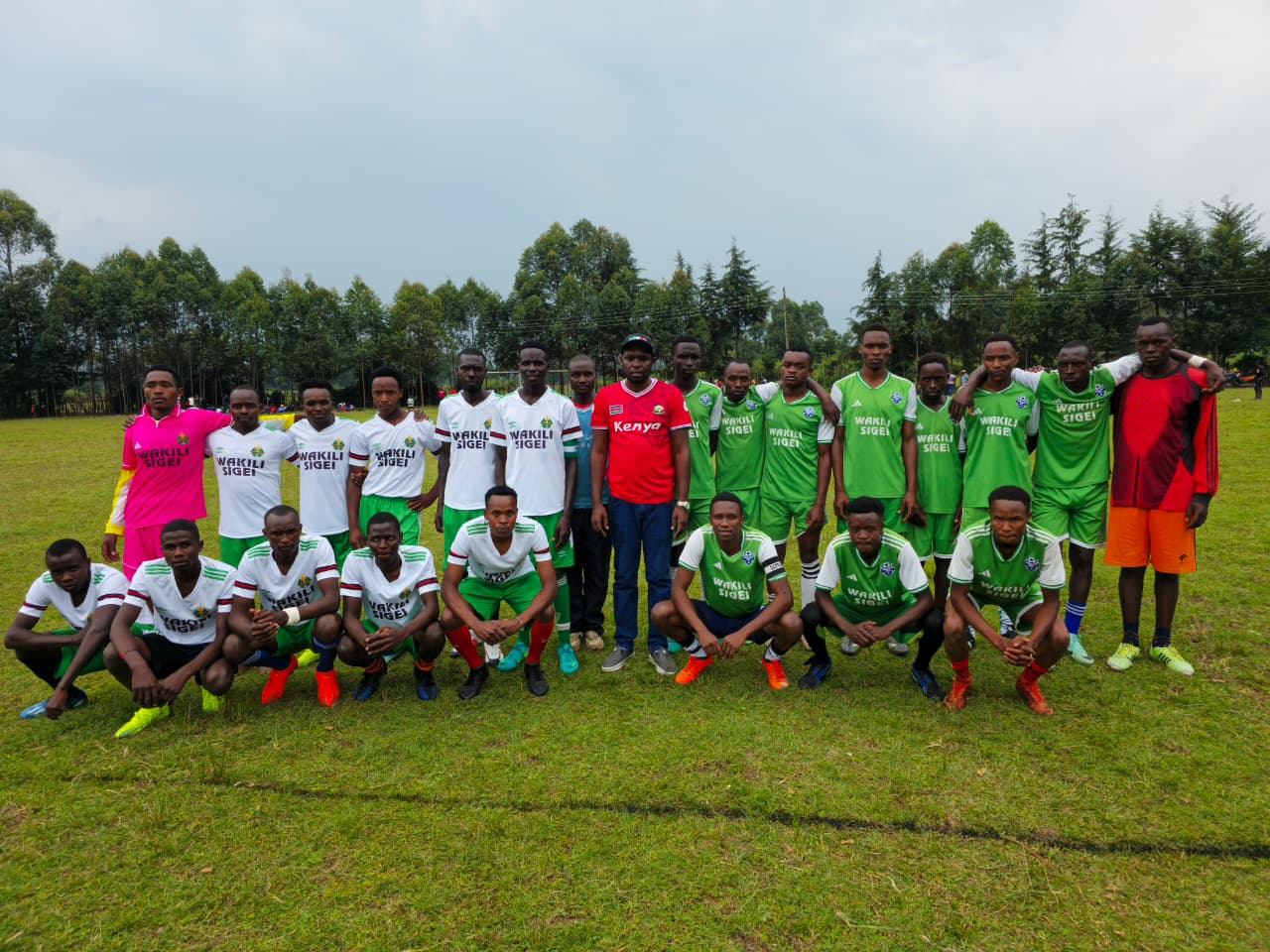 Sponsor Kenneth Rono together with players during the first edition of the Ken Ben Football Tournament held last year in Mutarakwa Ward, Bomet Central Sub-county.  PHOTO/Geoffrey Kirui
