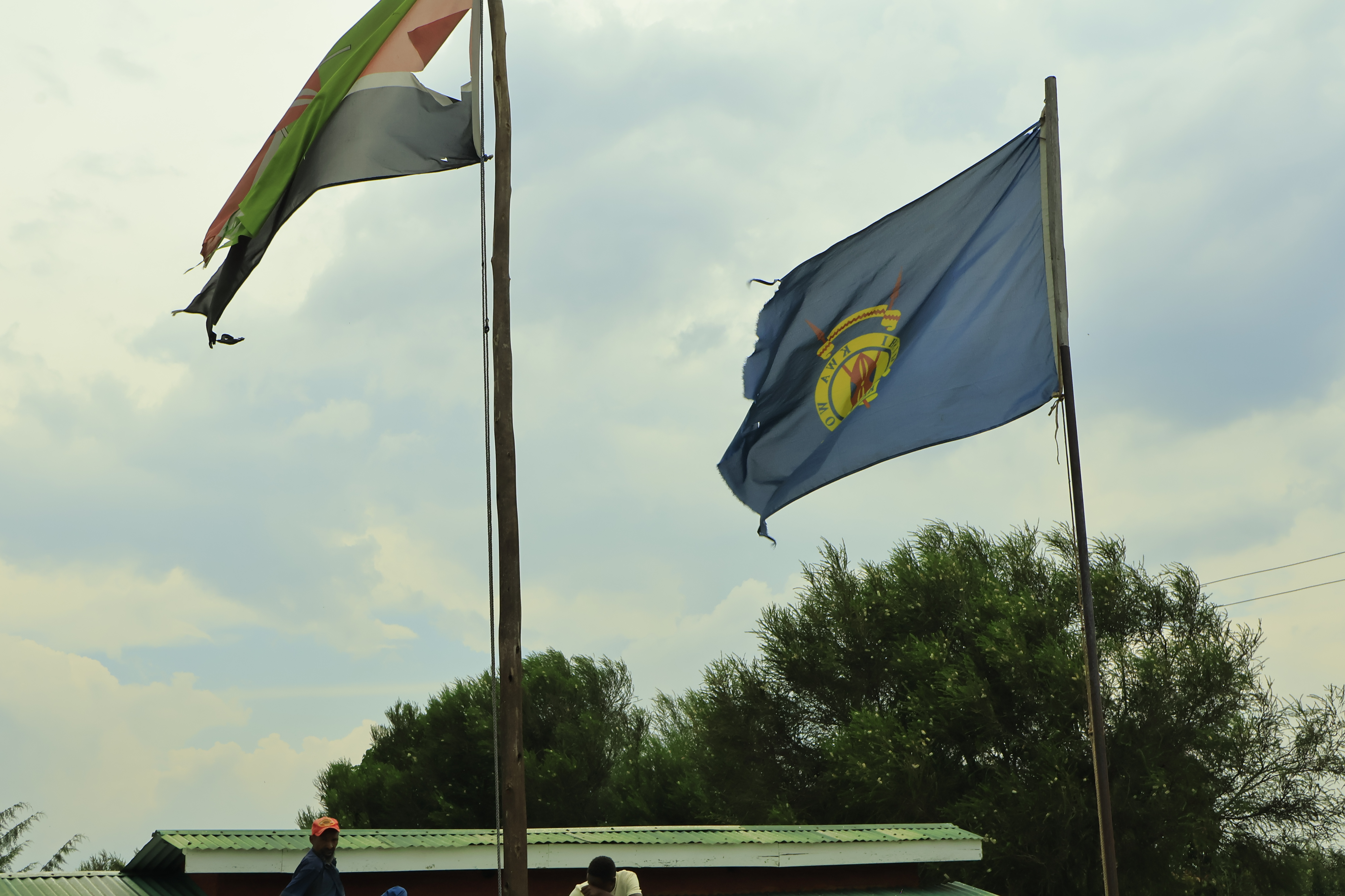 tattered flags at Chesoen Police station in Bomet central where a suspect ripped off teh roff of the cells and escaped . Photo/Kimagata Maridany