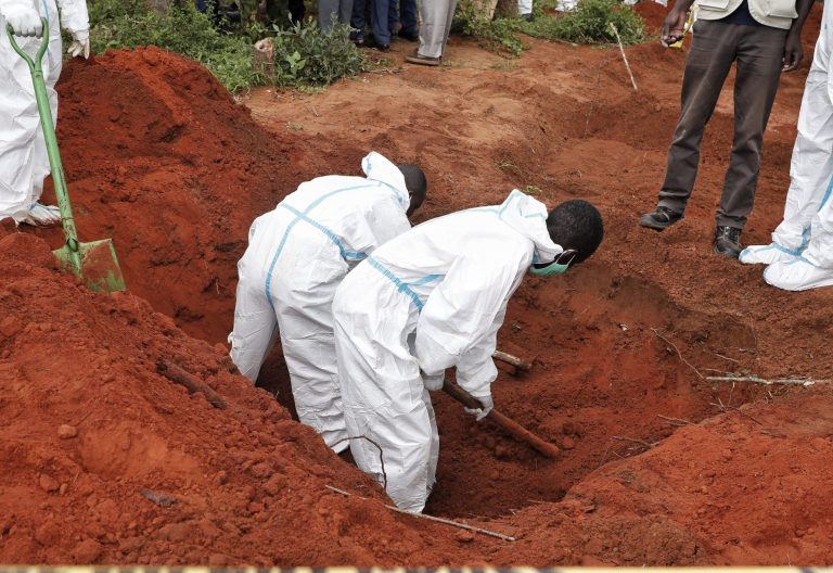 Workers dig up a grave in Shakahola forest in Malindi in 2023. PHOTO/@InteriorKE/X